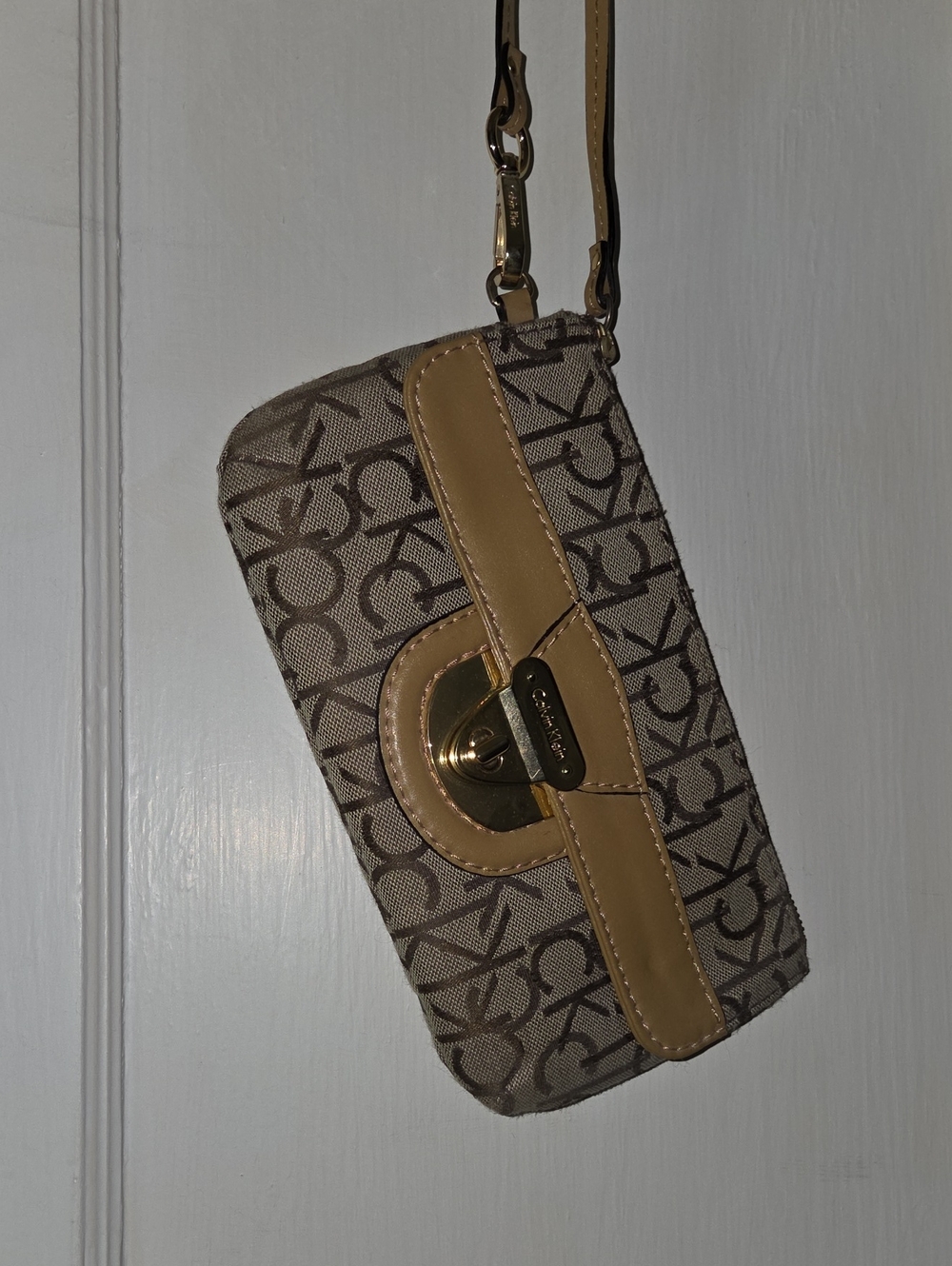 Calvin Klein Beige Logo Wristlet with Tan Trim and Gold Hardware